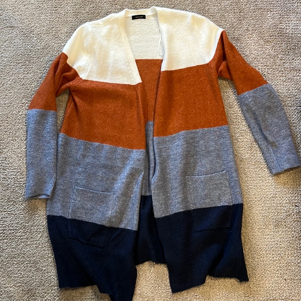 Long cardigan. Navy, cream, light blue and rust colored size M/L